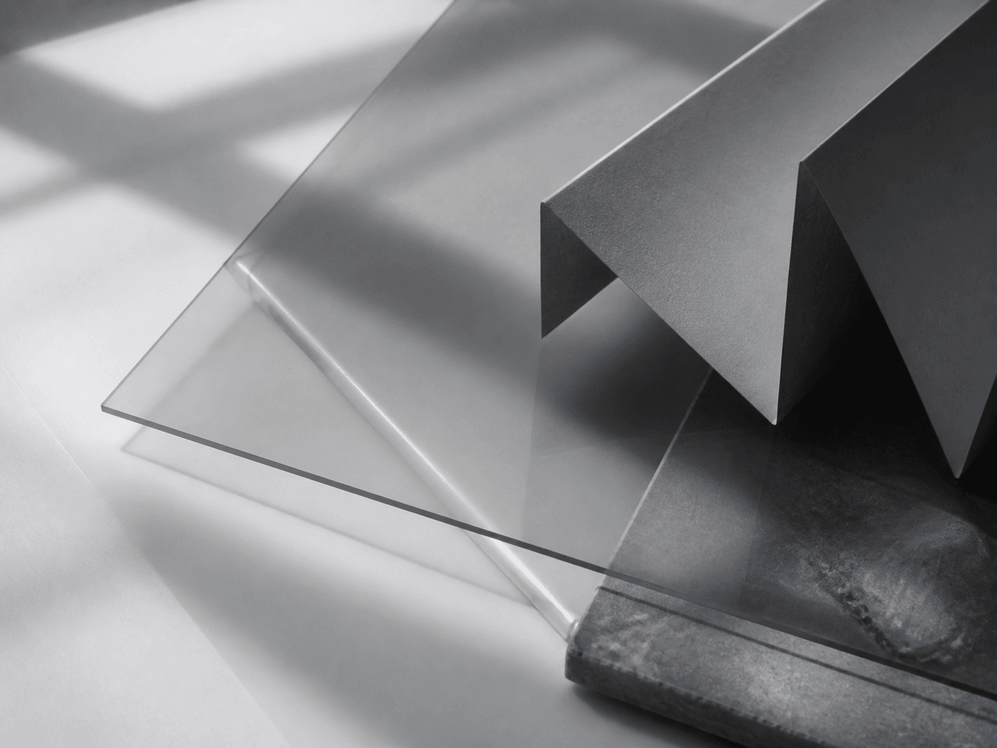 Layered editorial materials in a quiet studio